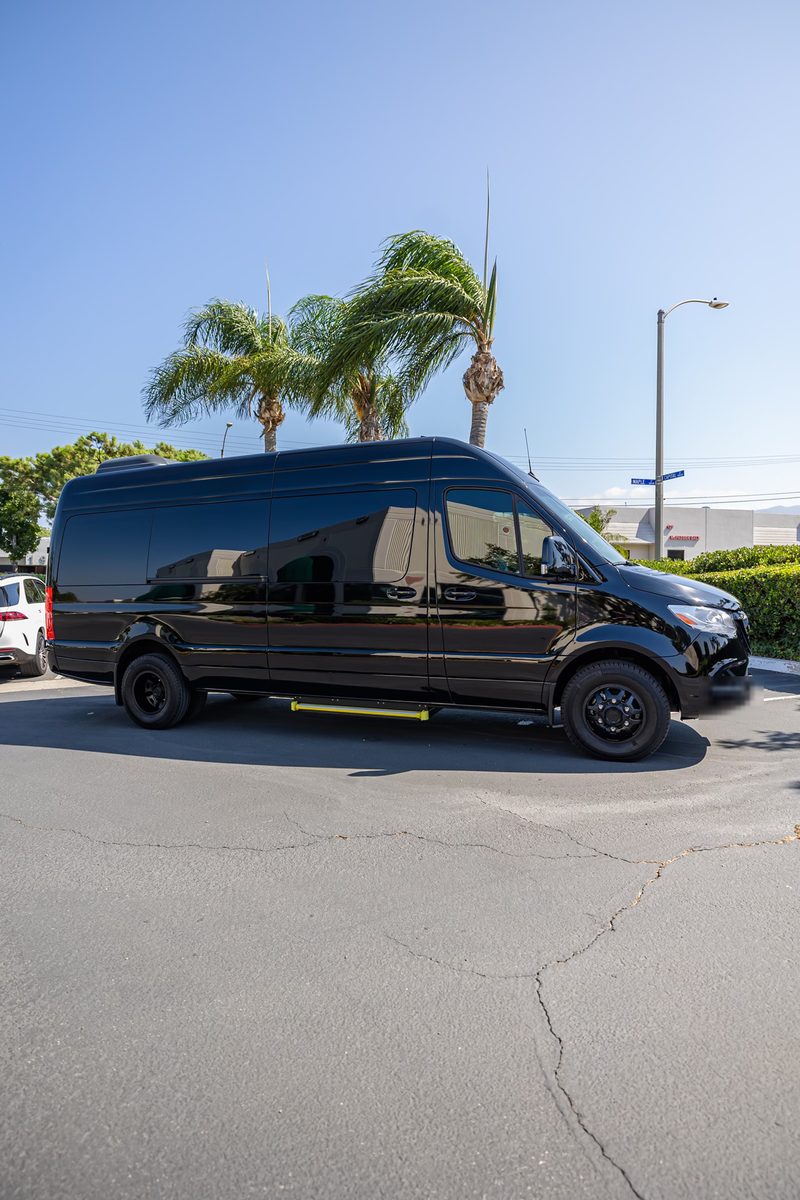 Black Mercedes-Benz Sprinter executive limo side profile, Milwaukee limo rental